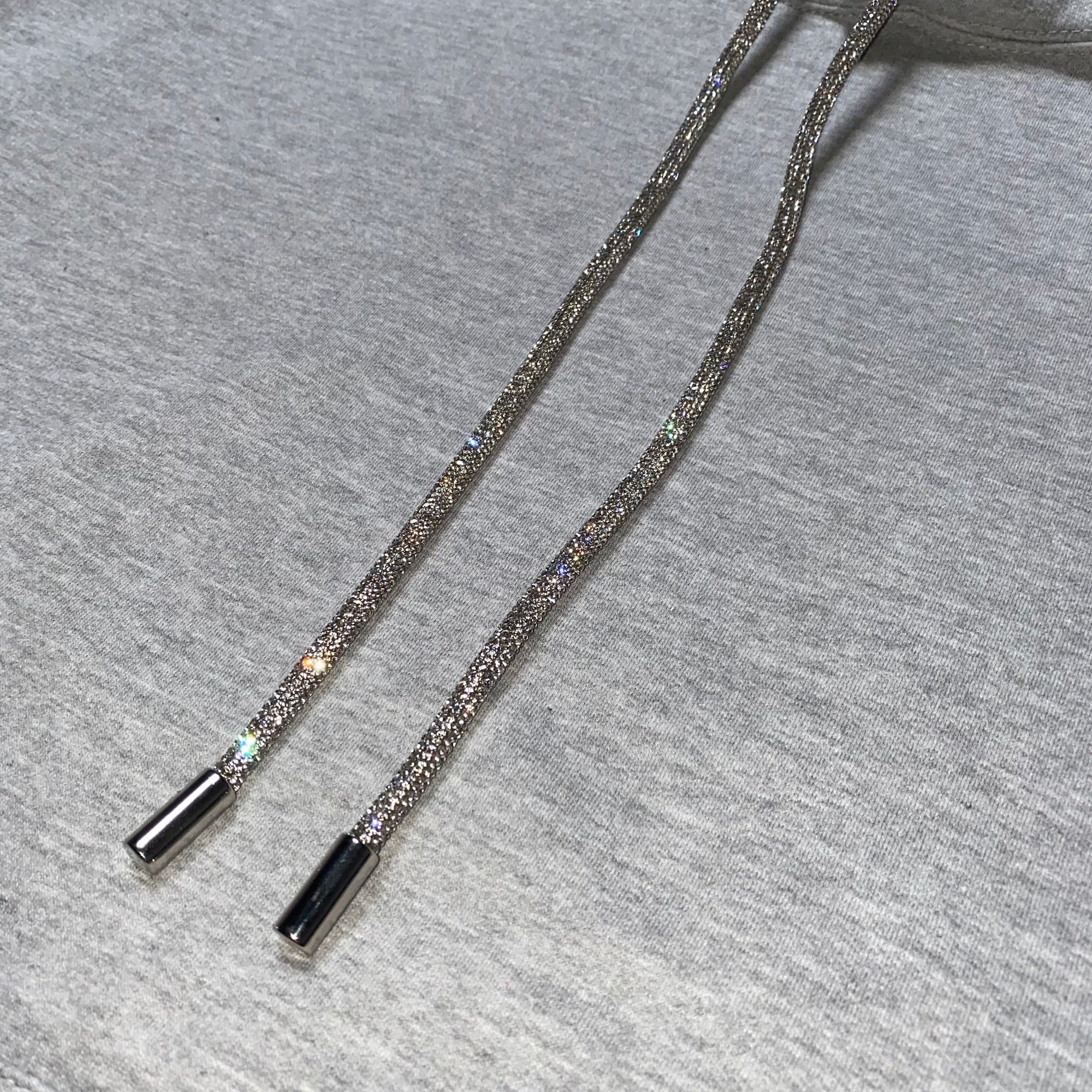 SLEEVELESS HOODIE WITH BLING STRING